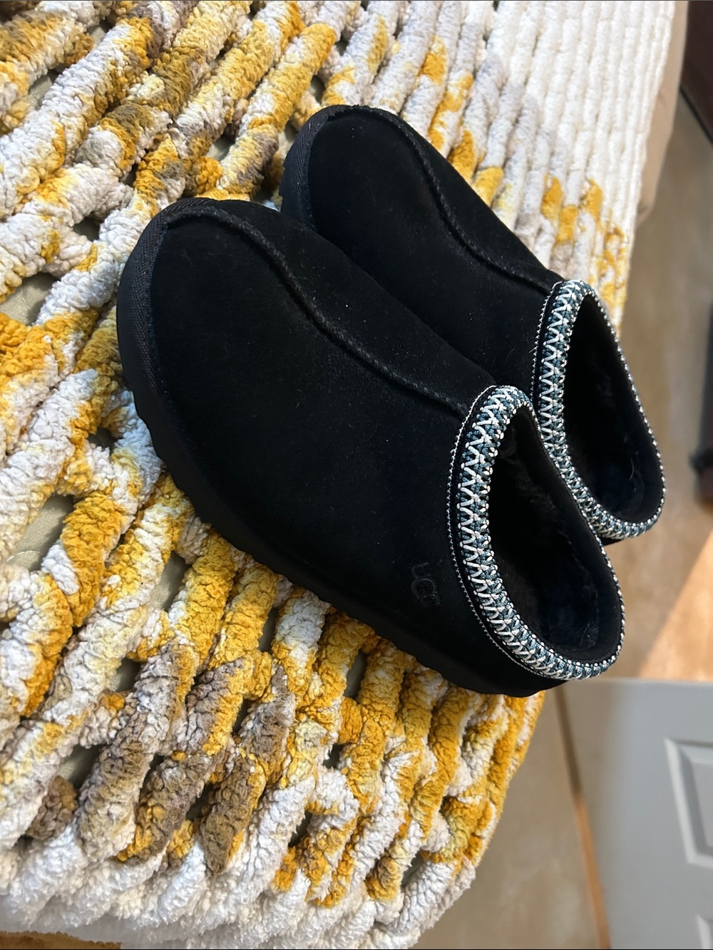 UGG Black Suede Cozy Slip-On Slippers with Braided Trim